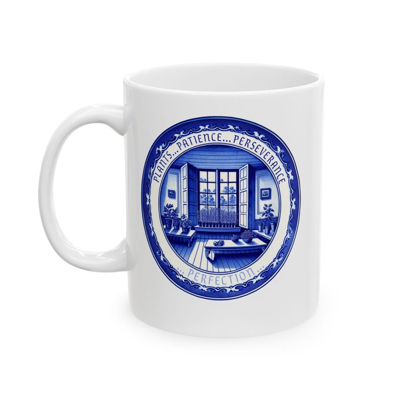 White ceramic plant mug with a blue-and-white Delftware greenhouse design
